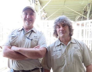 Ron Ringer, Lead Elephant Keeper (left), and Steve Herbert, Senior Elephant Keeper (right), work together in the Elephant Odyssey exhibit at the San Diego Zoo. They make sure the elephants have a clean exhibit, plenty of food, and lots of love!
