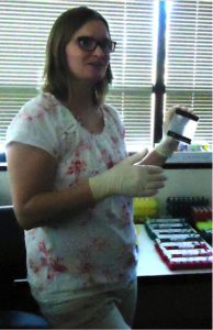 And that’s a wrap! Mrs. Reinbold places our DNA e-gel pads under a UV light so that we could see how the chromosomes traveled down.